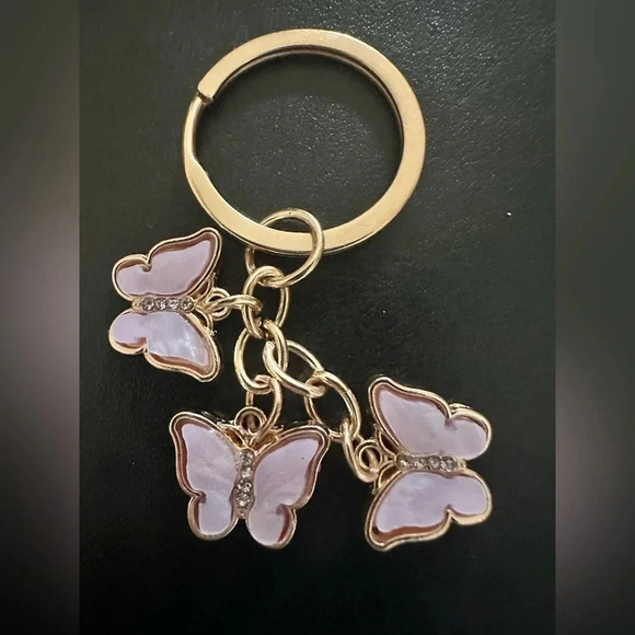 4 piece Butterfly and 5 cross keychains Lot - Picture 6 of 7